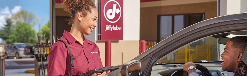Stock photo of employees inside a Jiffy Lube Location