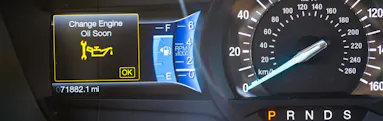 A vehicle's oil change light is on