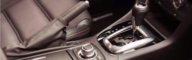 close up of an interior gear shift 